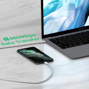 Pluggone MFi certified Lightning cable connected to MacBook Air and iPhone on modern desk